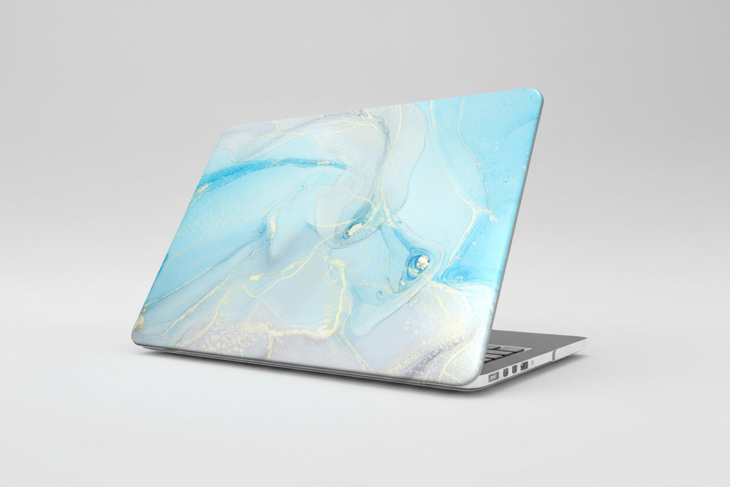 Laptop with a blue and white marble pattern on a white background