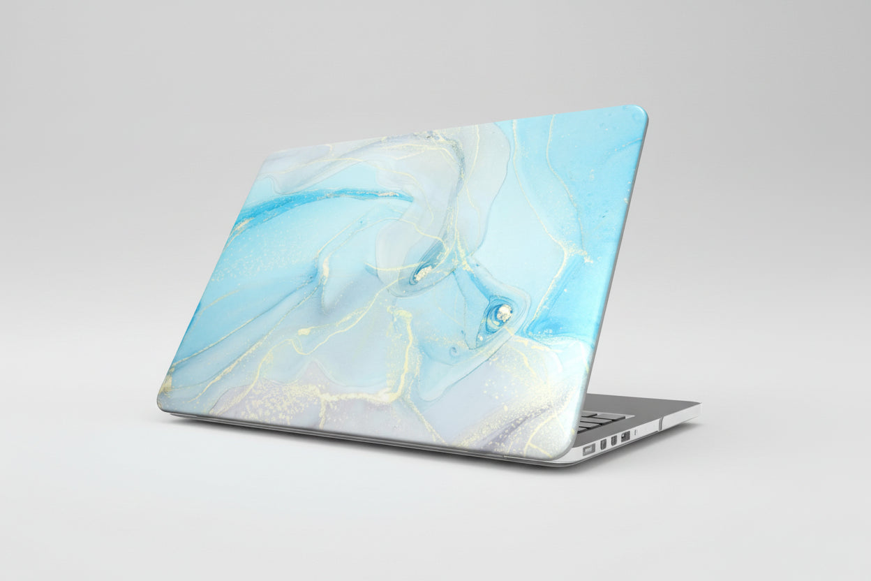 Laptop with a blue and white marble pattern on a white background