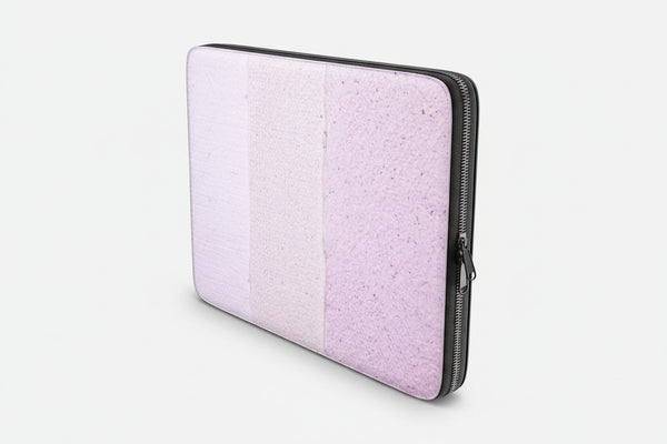 Laptop sleeve with a textured design on a white background