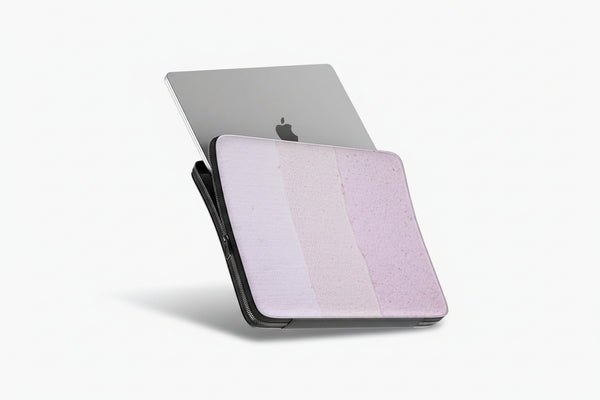 Laptop with a textured case on a white background