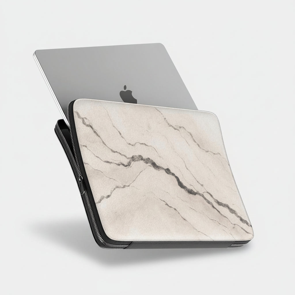 Laptop with a marble patterned skin on a white background